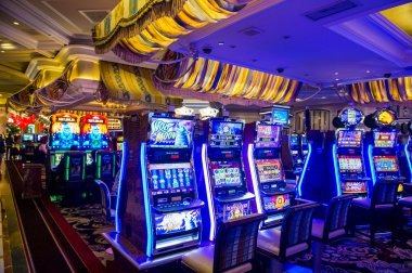 Live dealer studio with baccarat table and card display