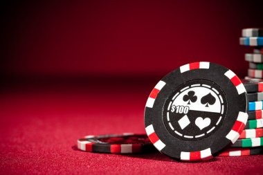 Mobile phone displaying live baccarat table interface